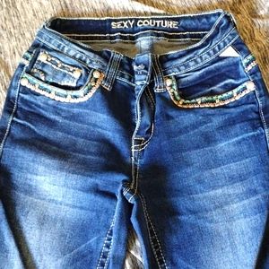 SEXY COUTURE, Size 1, straight leg blue jeans.